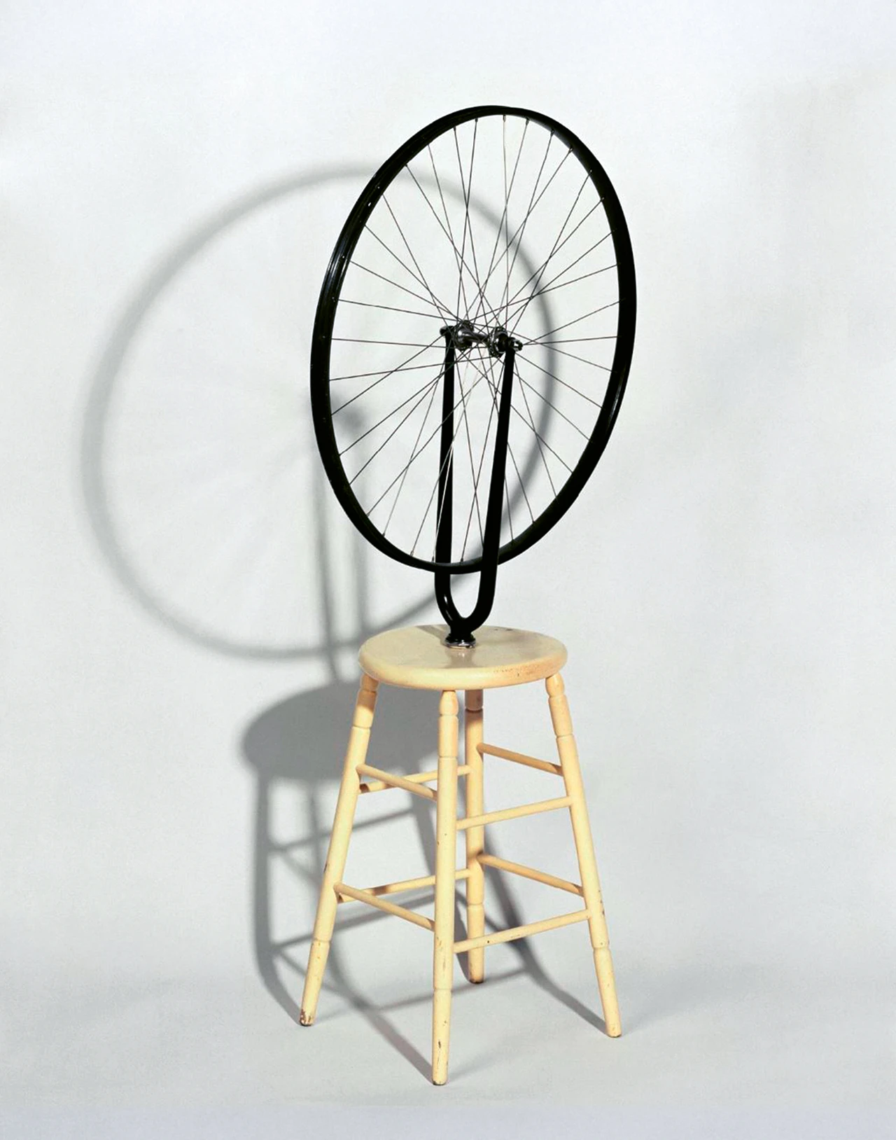 Photo of a bicycle wheel on a chair